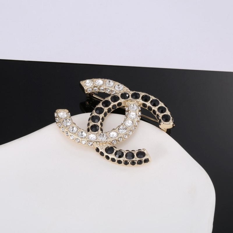 Ch**el brooches